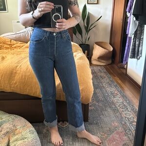 Vintage high waisted straight leg Levi’s with a raw hem size 25